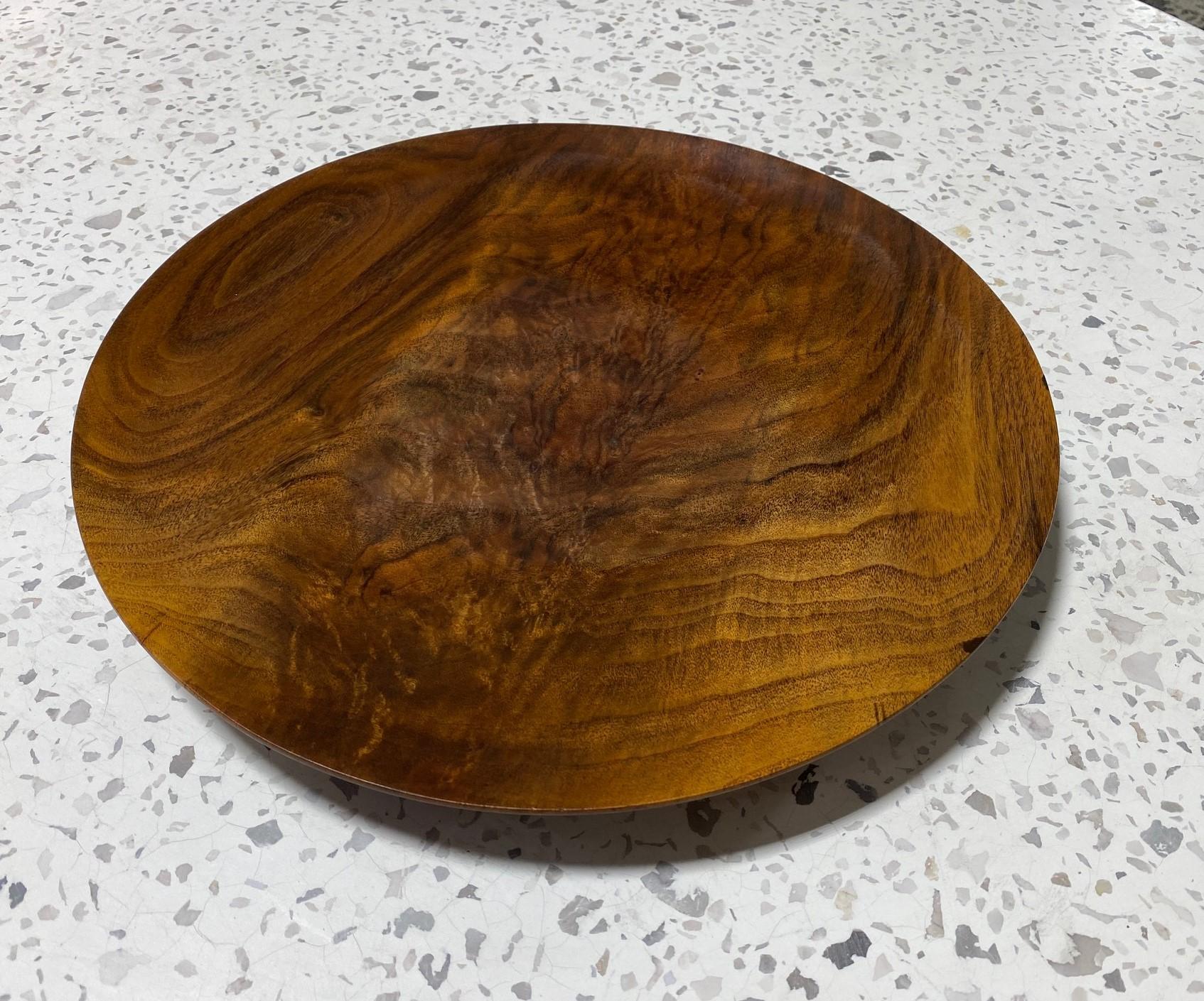 An exquisitely crafted, large wood charger/platter by American California master Woodturner Bob Stocksdale.
Signed, dated (1980) and marked (
