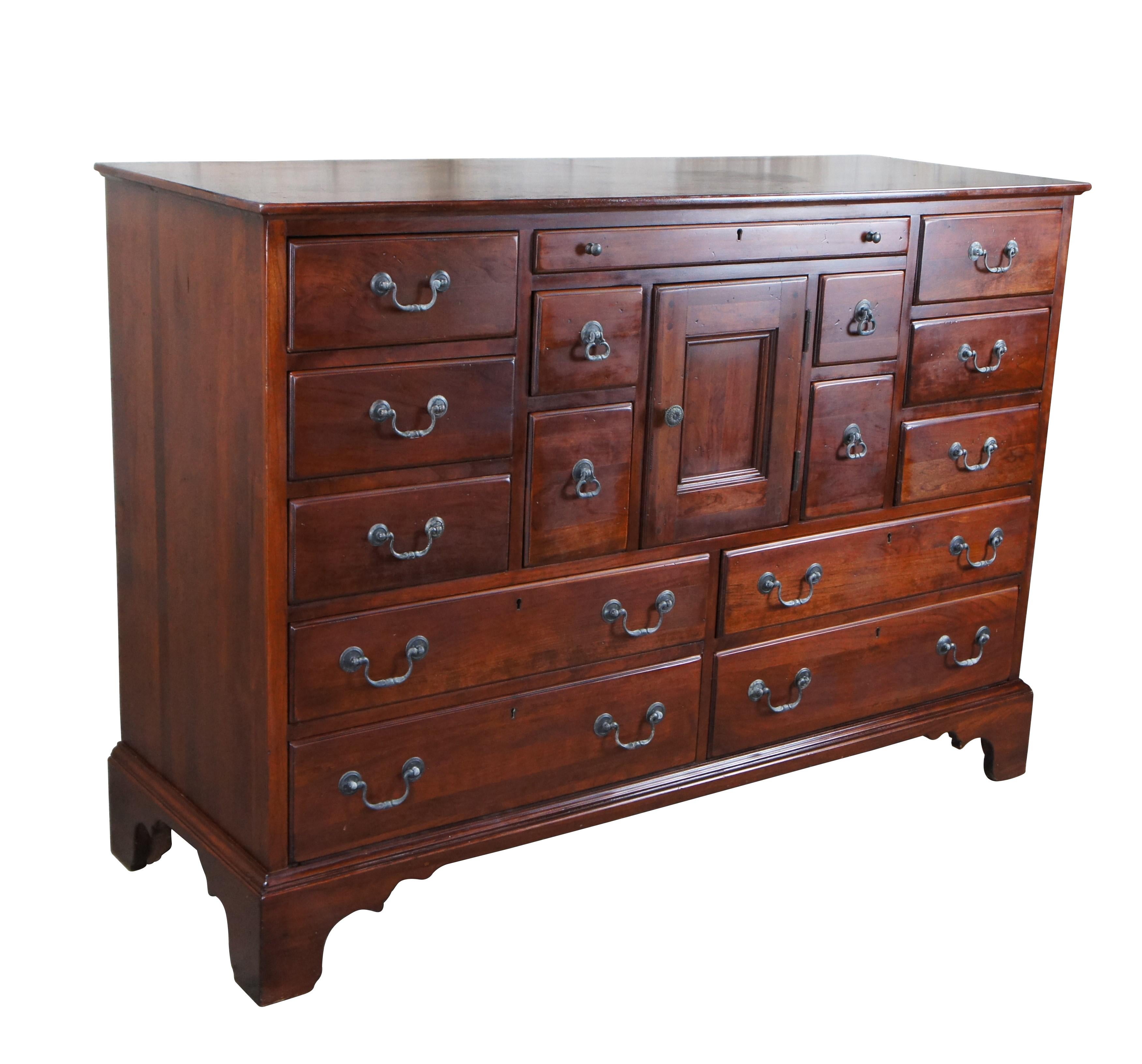 Vintage Bob Timberlake for Lexington Furniture traditional / mission style collectors bureau / chest / sideboard / credenza / buffet / dresser or console.  Made of cherry featuring rectangular form with 15 apothecary style drawers and center cabinet