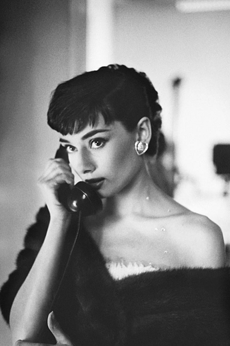 Bob Willoughby Black and White Photograph - Audrey Hepburn, on Telephone, Paramount Studios - B&W Estate Print   
