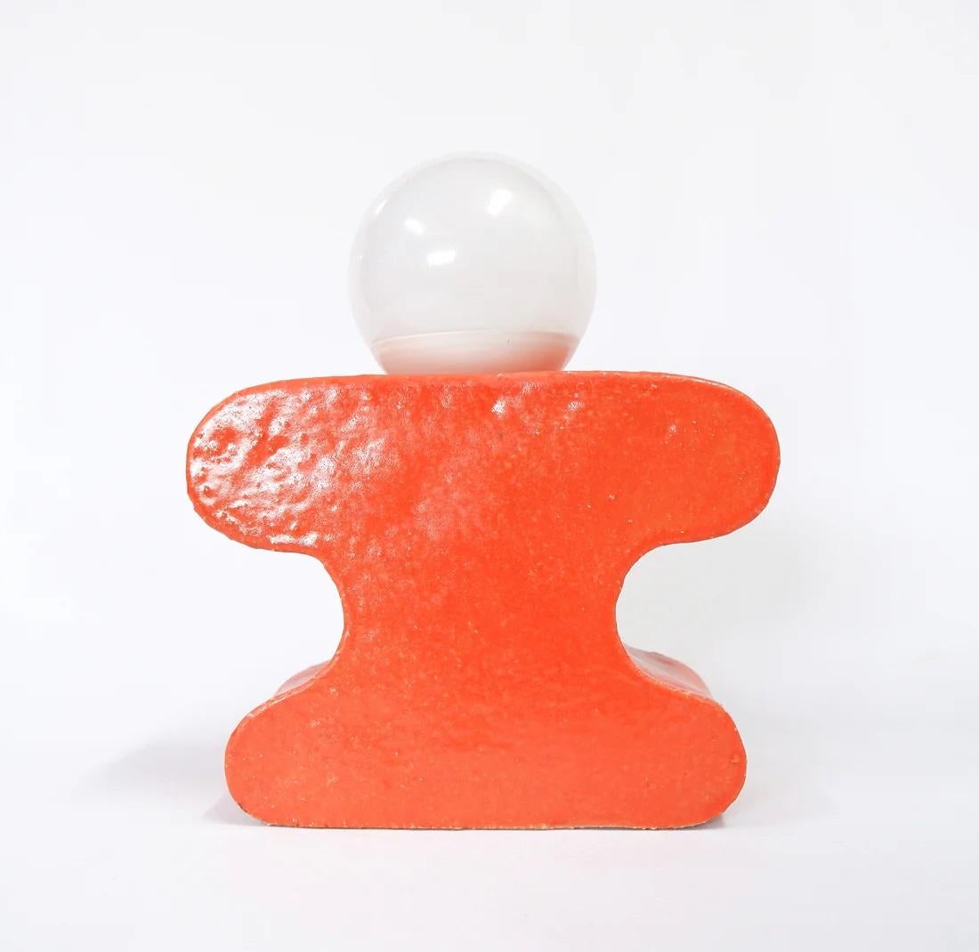 Boba Mini Donna II Table Lamp by Curvy World Studio
Handmade
Dimensions: D 10 x W 20 x H 24 cm.
Materials: White stoneware, orange glaze, electric system, dimmable e27 bulb, textile cable.

The Mini Donna II lamp belongs to the eponymous collection.