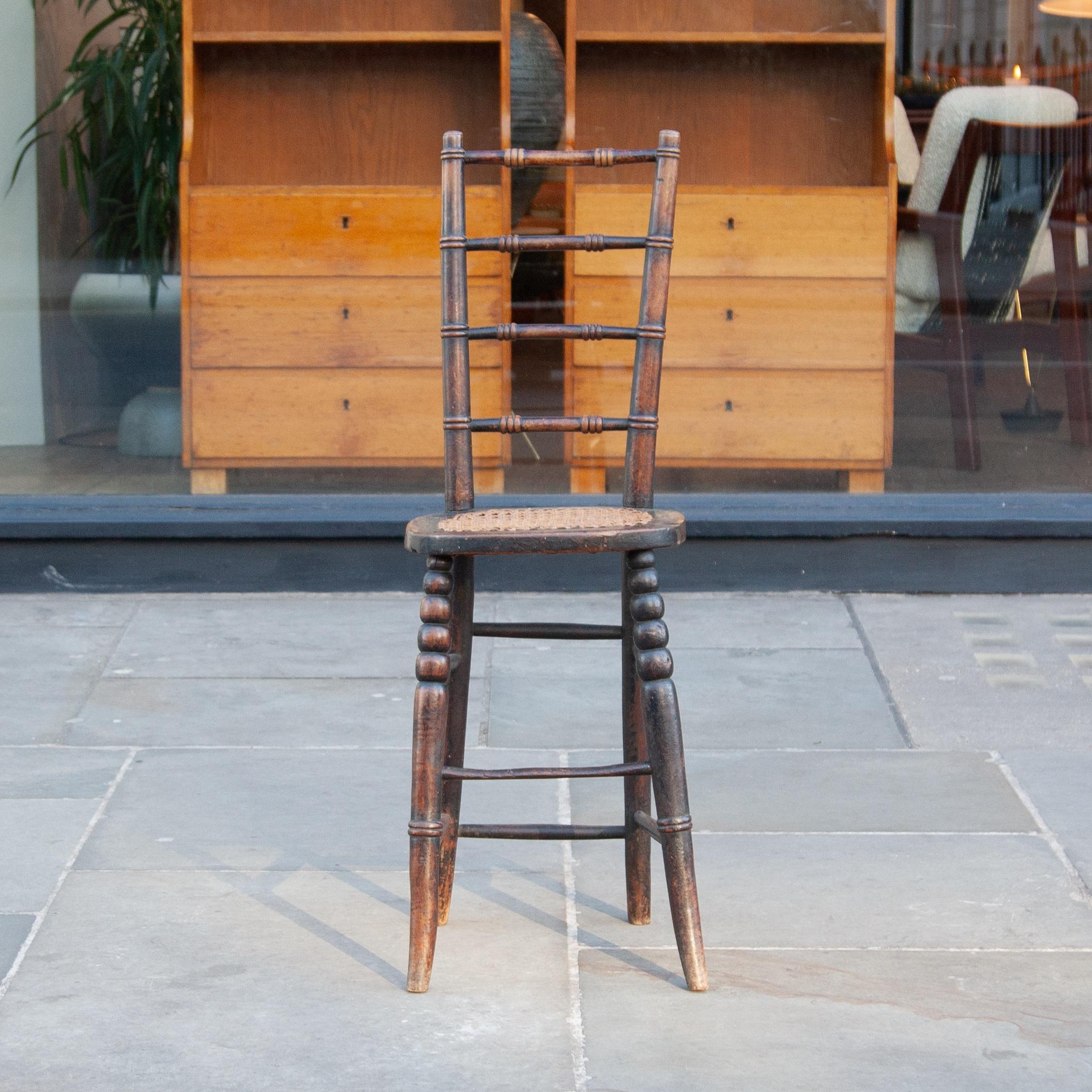 A beautifully ornate and very charming Victorian correctional chair.

Correctional chairs were originally conceived by 18th century surgeon and anatomist, Sir Astley Paston Cooper, to correct the posture of slouching children. The shallow seat and