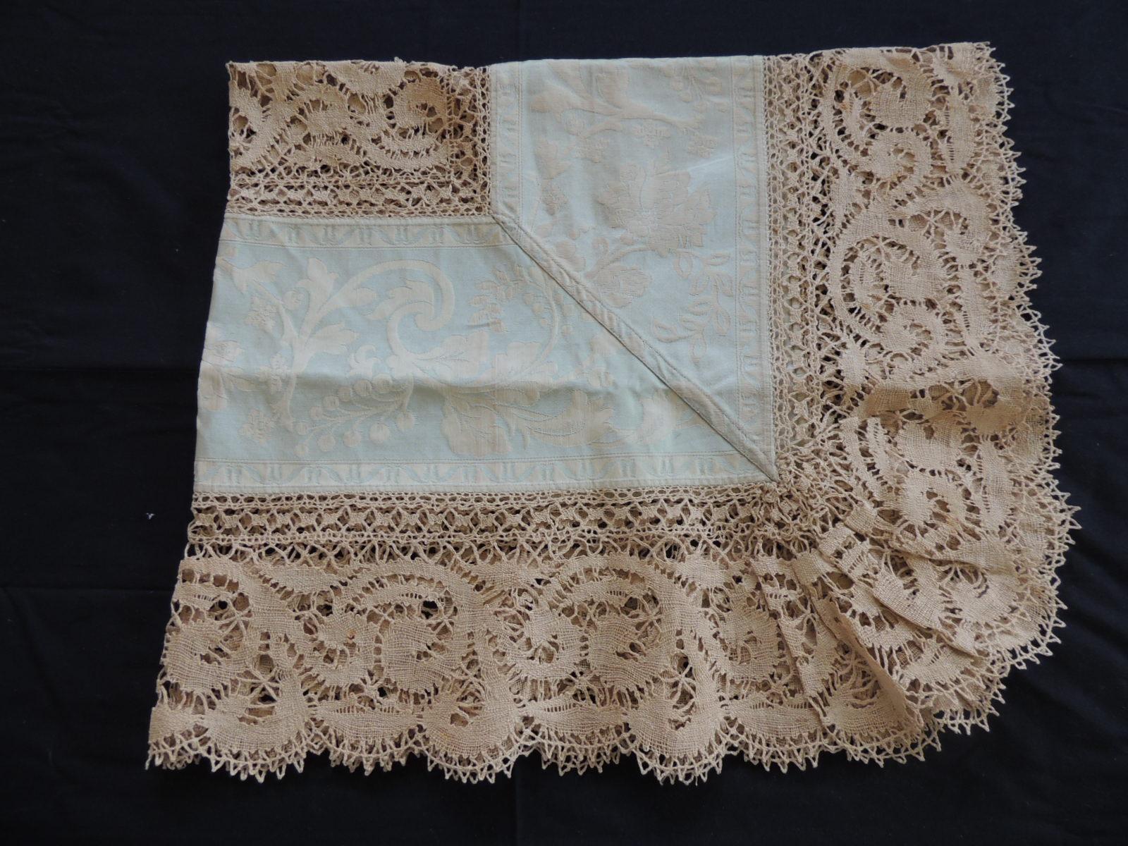 Bobbin lace and damask pillow topper with large lace center panel.
Ruffle lace edges border is about 5.5