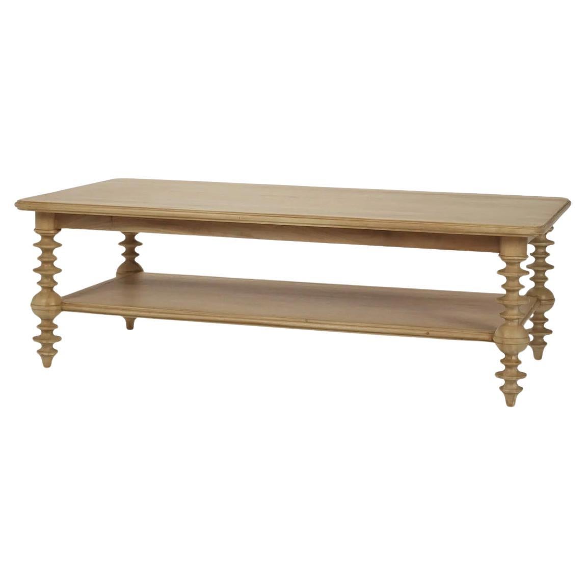 Couchtisch mit geklöppelten Beinen in Obstholzoptik im Angebot