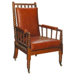 Bobbing turned English rosewood armchair with cane seat