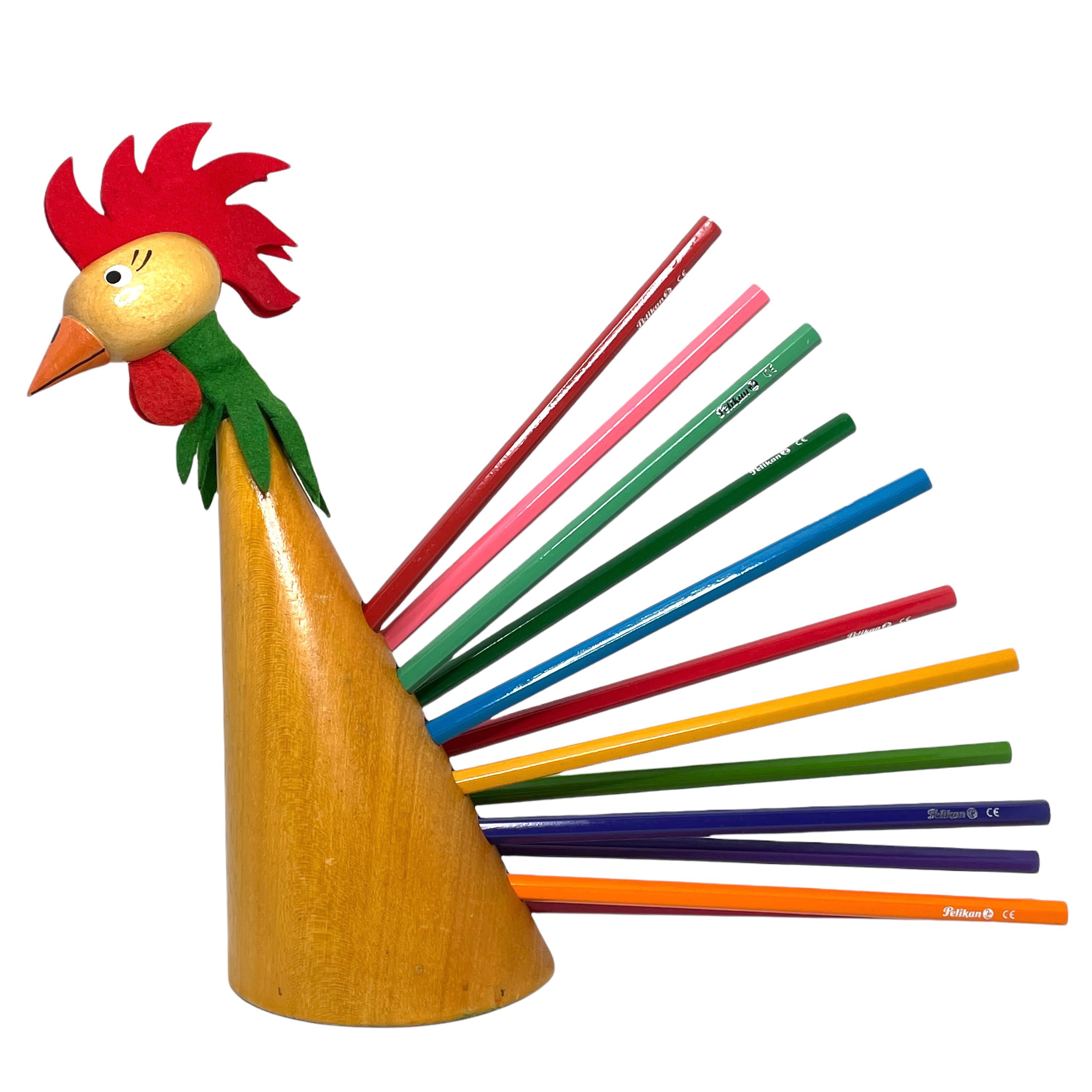 Classic early 1960s Danish design wood rooster sculpture as a pencil holder. Nice addition to your table or just for your collection of design items. Made of wood. Found at an estate sale in Vienna, Austria. Pencils shown in the picture are not