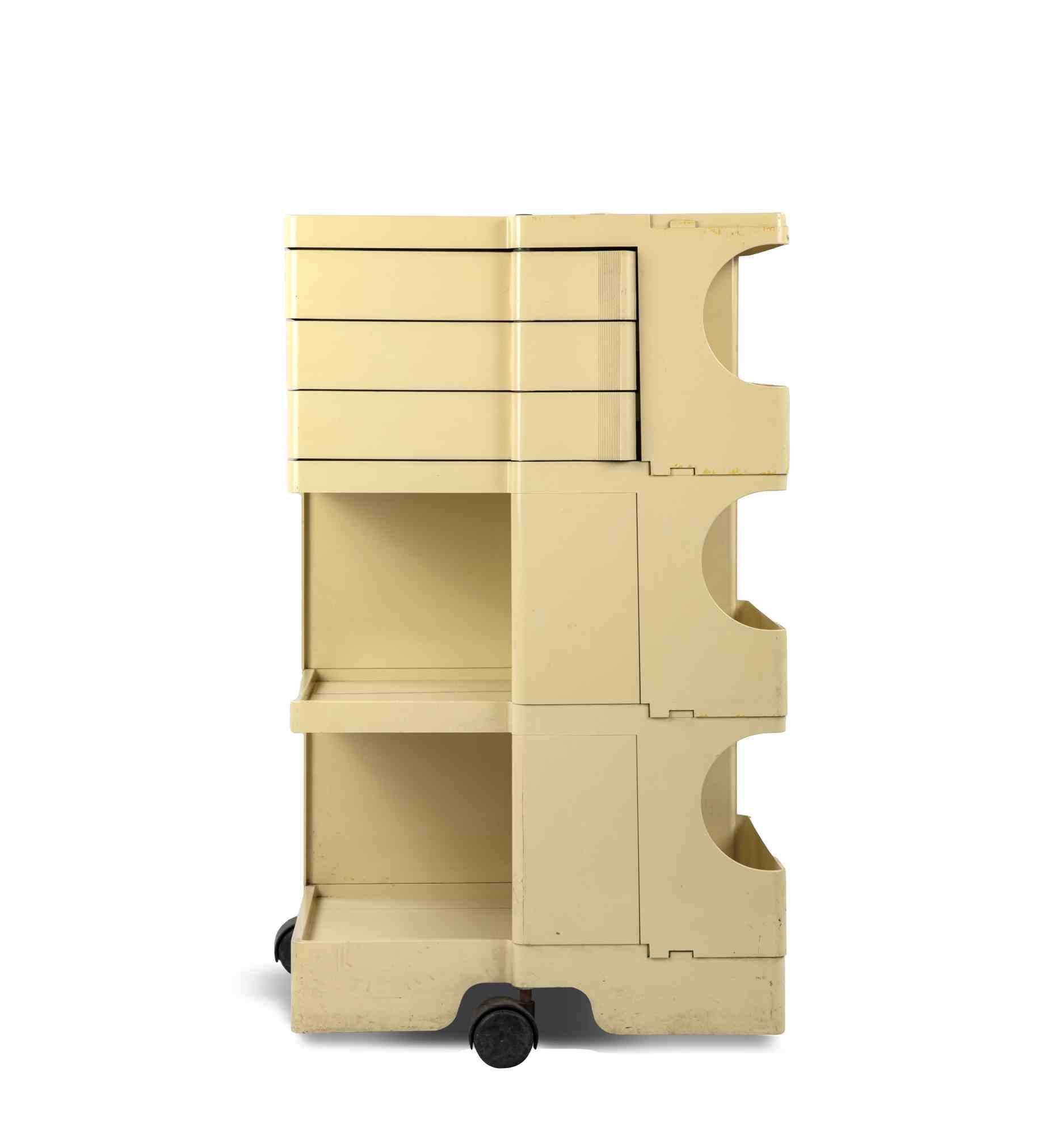 Bobby Cart is an original decorative object realized by Gio Colombo during the 1970s.

81 X 36 cm.   

Designed by Joe Colombo for B-line, this cart has structure and drawers in injection-moulded ABS plastic material. Tie rods, screws and pivots in