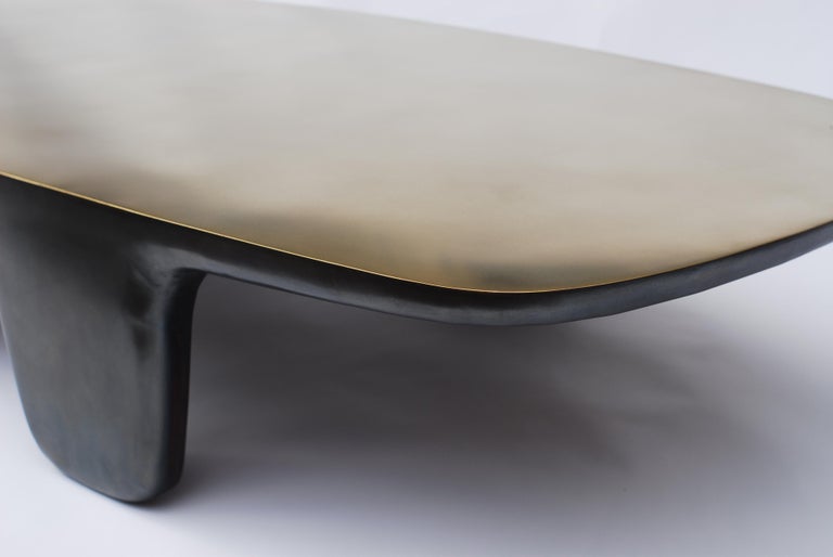 Bobo brass coffee table - signed by Stefan Leo
Brass patinated 
Measures: 190 x 81cm, H:35 cm
(Other dimensions, materials can be made to order)

Atelier Stefan Leo has a remarkable reputation thanks to its unique furniture designs created with