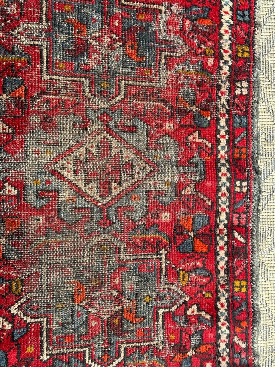 Hand-Knotted distressed small Heriz rug  For Sale