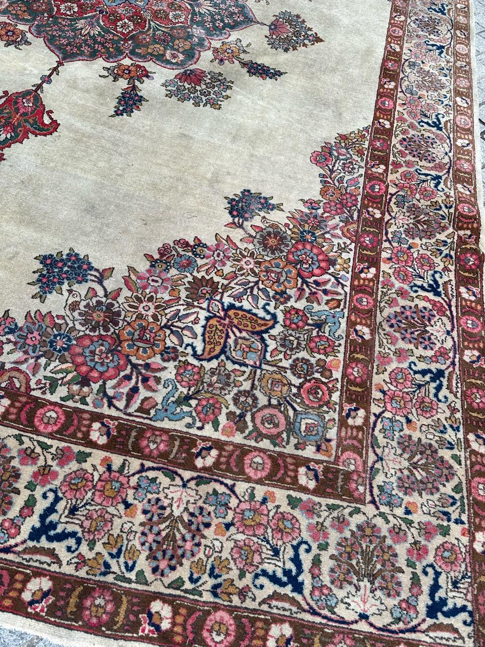 Nice large antique Kirman rug with beautiful floral design and nice colours , entirely and finely hand knotted with wool on cotton foundation 