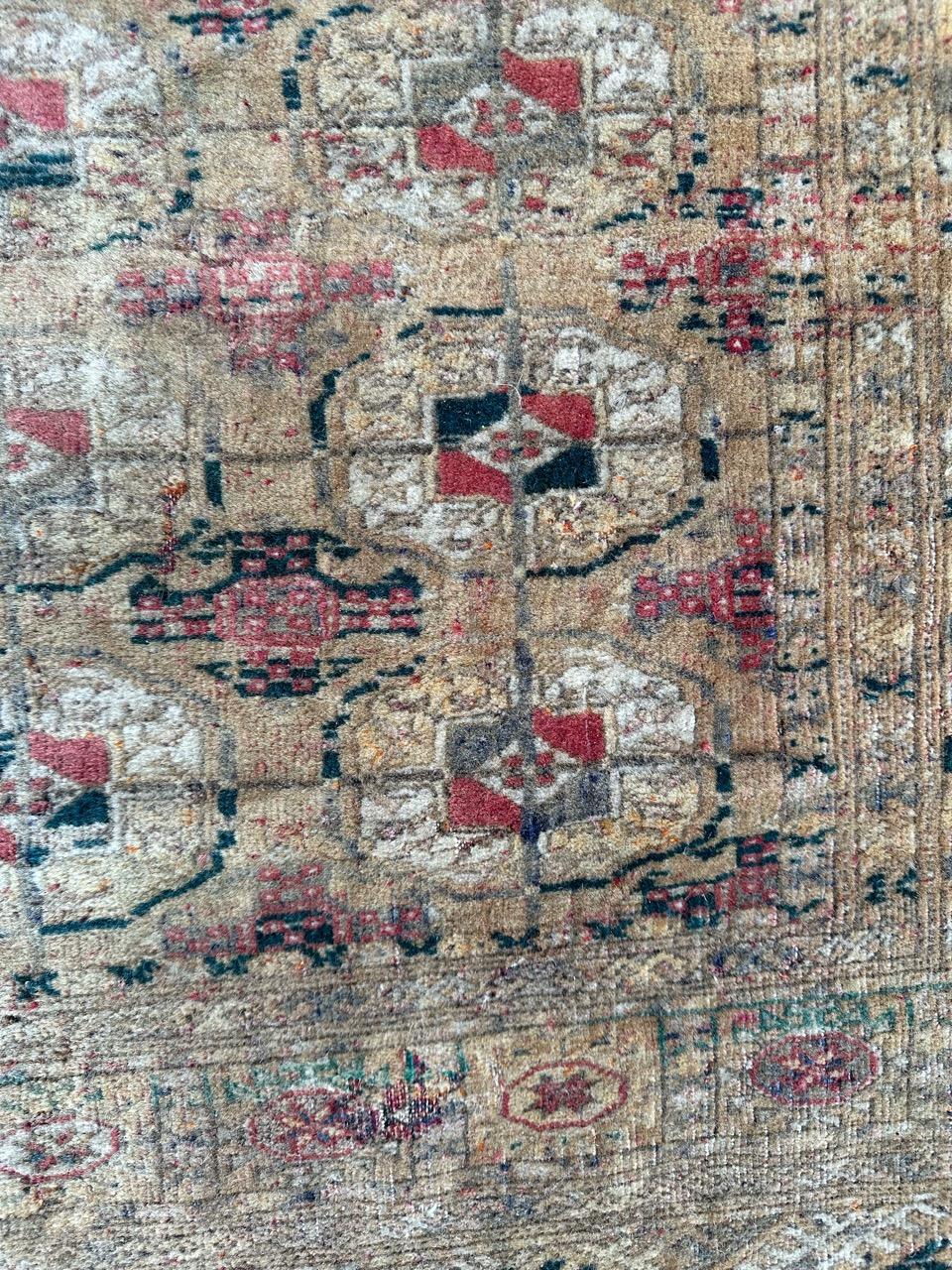 Turkmen Bobyrug’s distressed antique Bokhara rug  For Sale