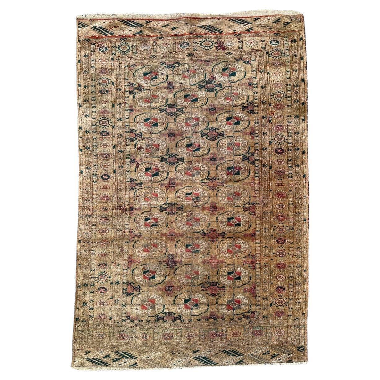 Bobyrug’s distressed antique Bokhara rug  For Sale