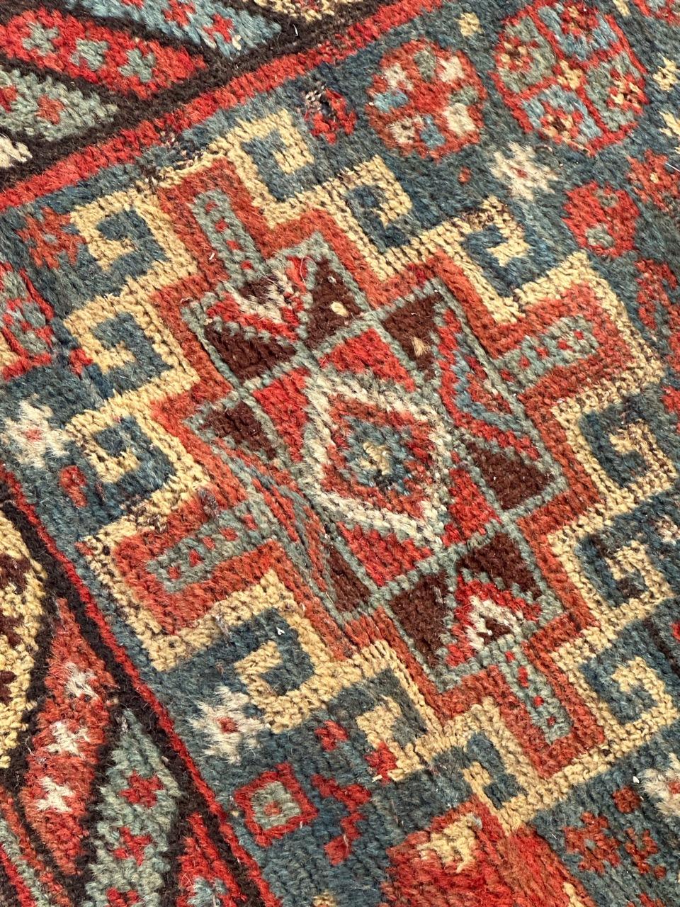 Bobyrug’s distressed antique Shiraz rug For Sale 8