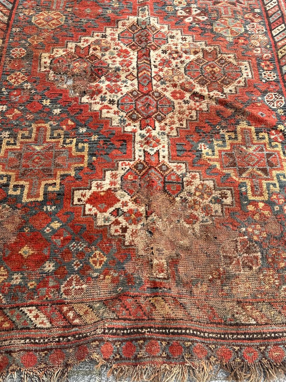 Asian Bobyrug’s distressed antique Shiraz rug For Sale
