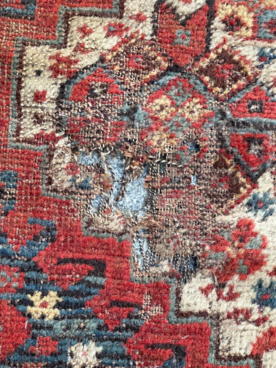 Wool Bobyrug’s distressed antique Shiraz rug For Sale