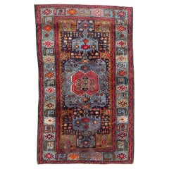 Vintage Bobyrug’s distressed mid century Hamadan rug