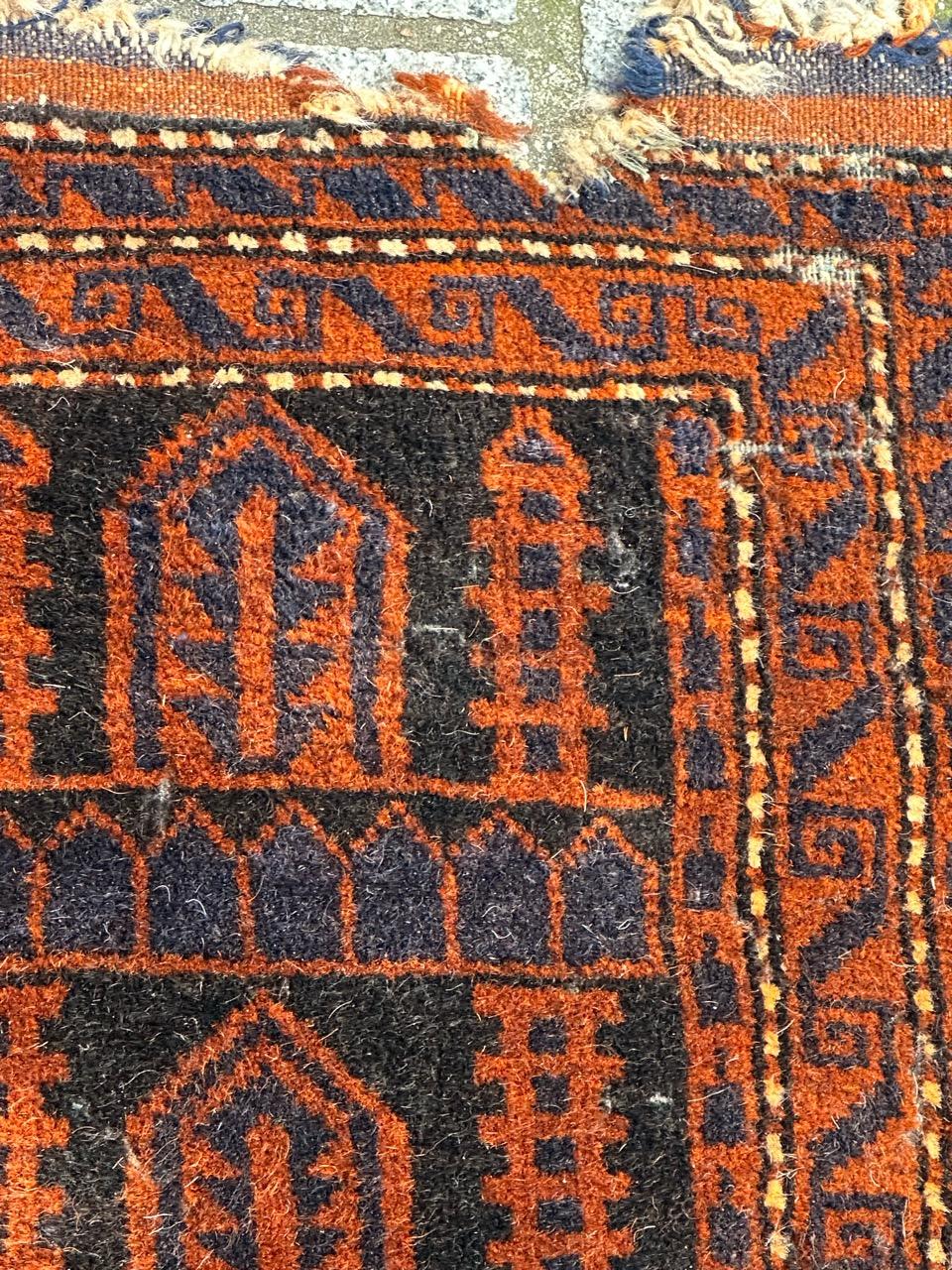Tribal Bobyrug’s distressed vintage tribal Baluch rug  For Sale