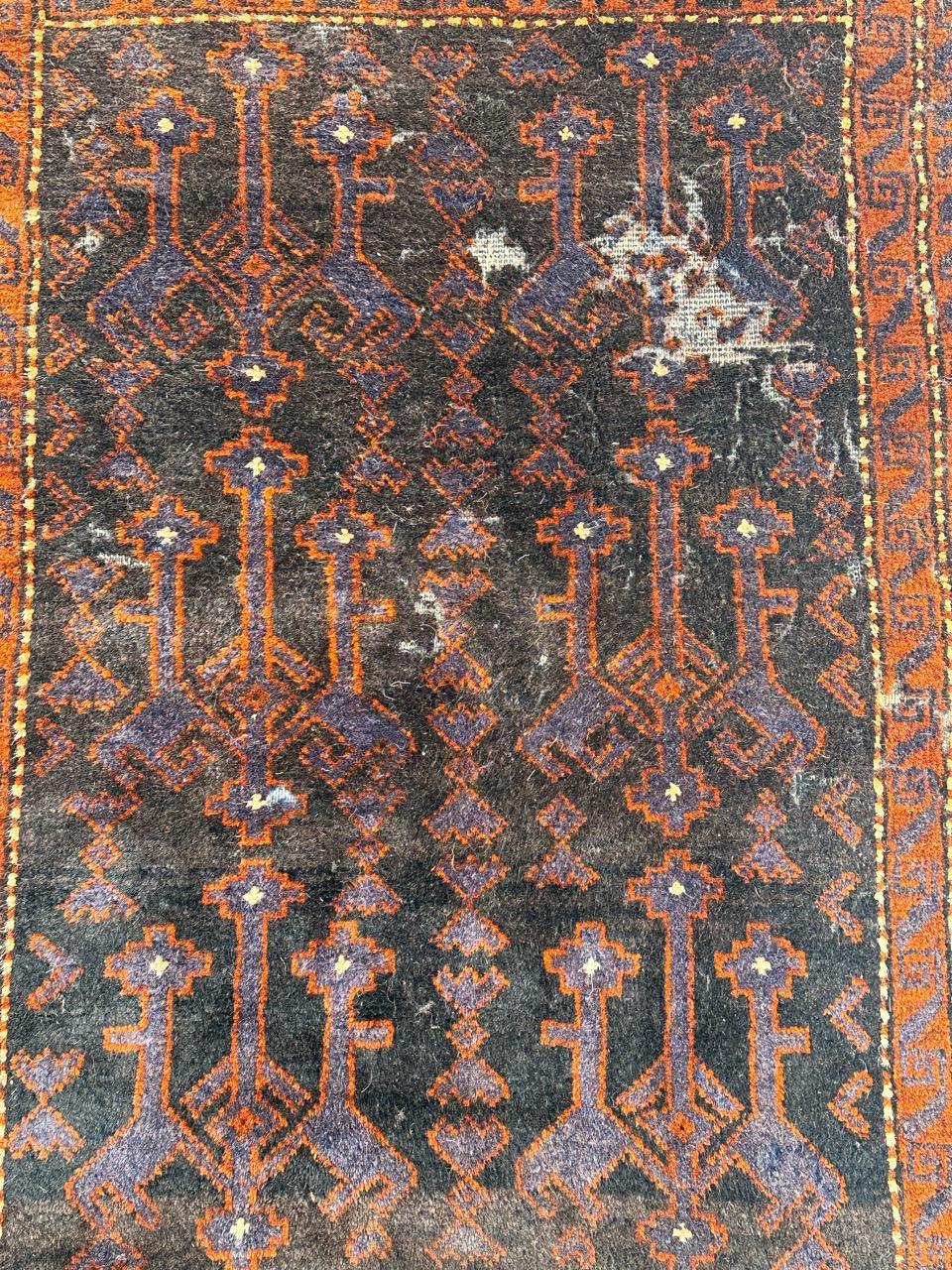 Afghan distressed vintage tribal Baluch rug  For Sale