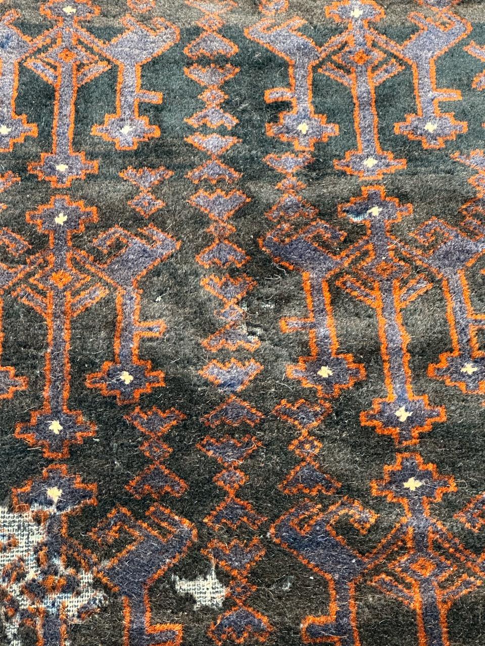 Wool Bobyrug’s distressed vintage tribal Baluch rug  For Sale
