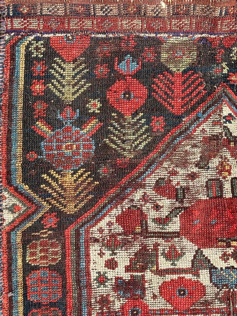 Tribal Bobyrug’s nice antique distressed qashqai fragment rug  For Sale