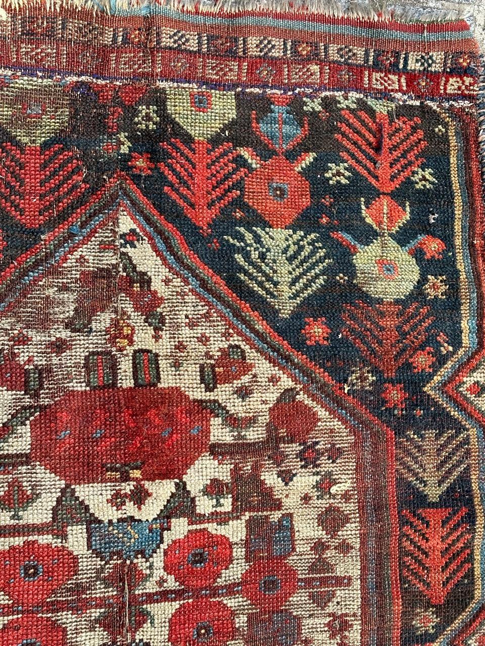 Asian Bobyrug’s nice antique distressed qashqai fragment rug  For Sale