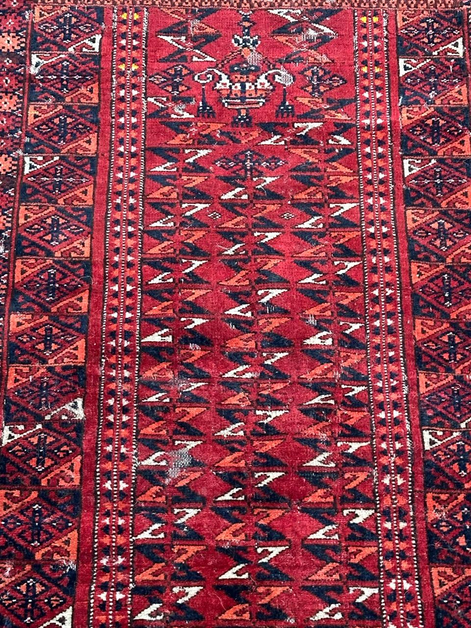 Pretty antique tribal Turkmen rug with nice unusual design with at the top, the design of two constructions and geometrical tribal designs at other parts, and with beautiful natural colours, entirely and finely hand knotted with wool on wool