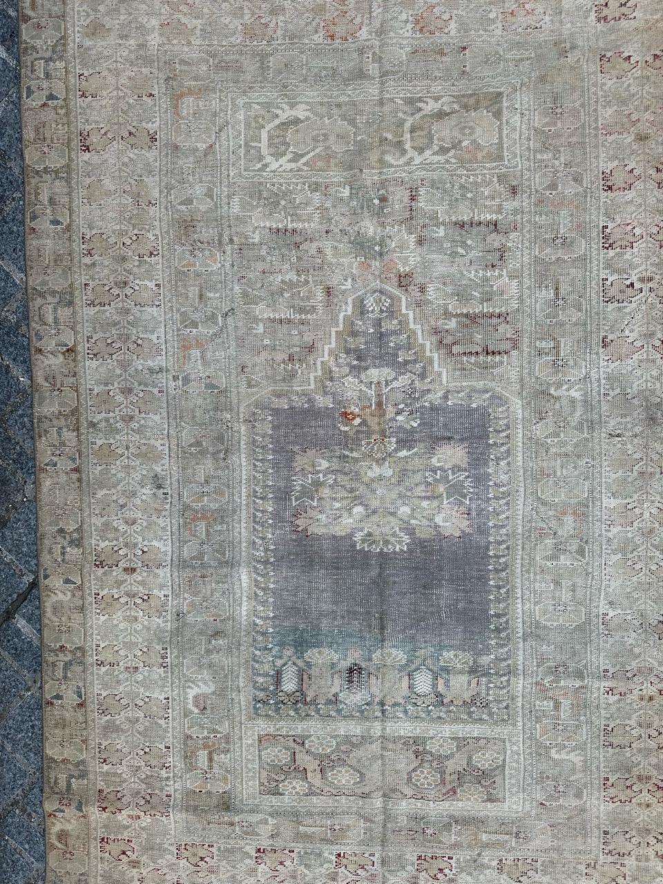 Pretty early 19th century Turkish rug from Yordes, with a beautiful mihrab design of very old Turkish rugs, and nice natural colours, used an uniform wears and little damage, due to the age and the use. Entirely and finely hand knotted with wool on