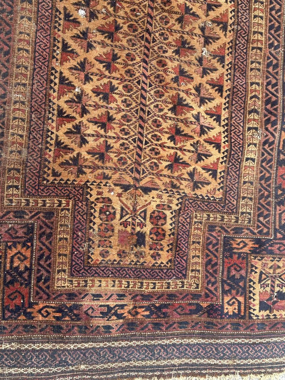 Tribal nice distressed antique fine tribal Baluch rug  For Sale
