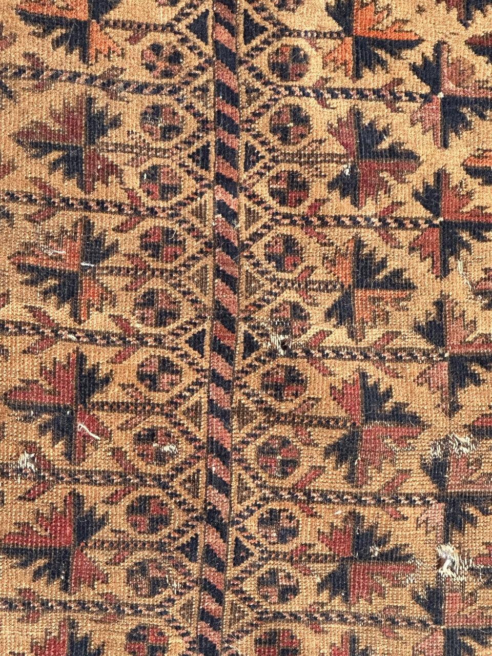 Laine Bobyrug's nice distressed antique fine tribal Baluch rug  en vente