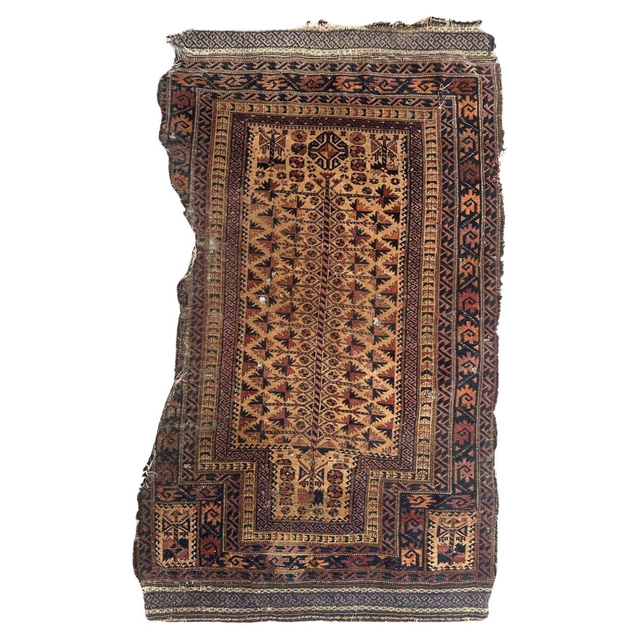 Bobyrug's nice distressed antique fine tribal Baluch rug  en vente