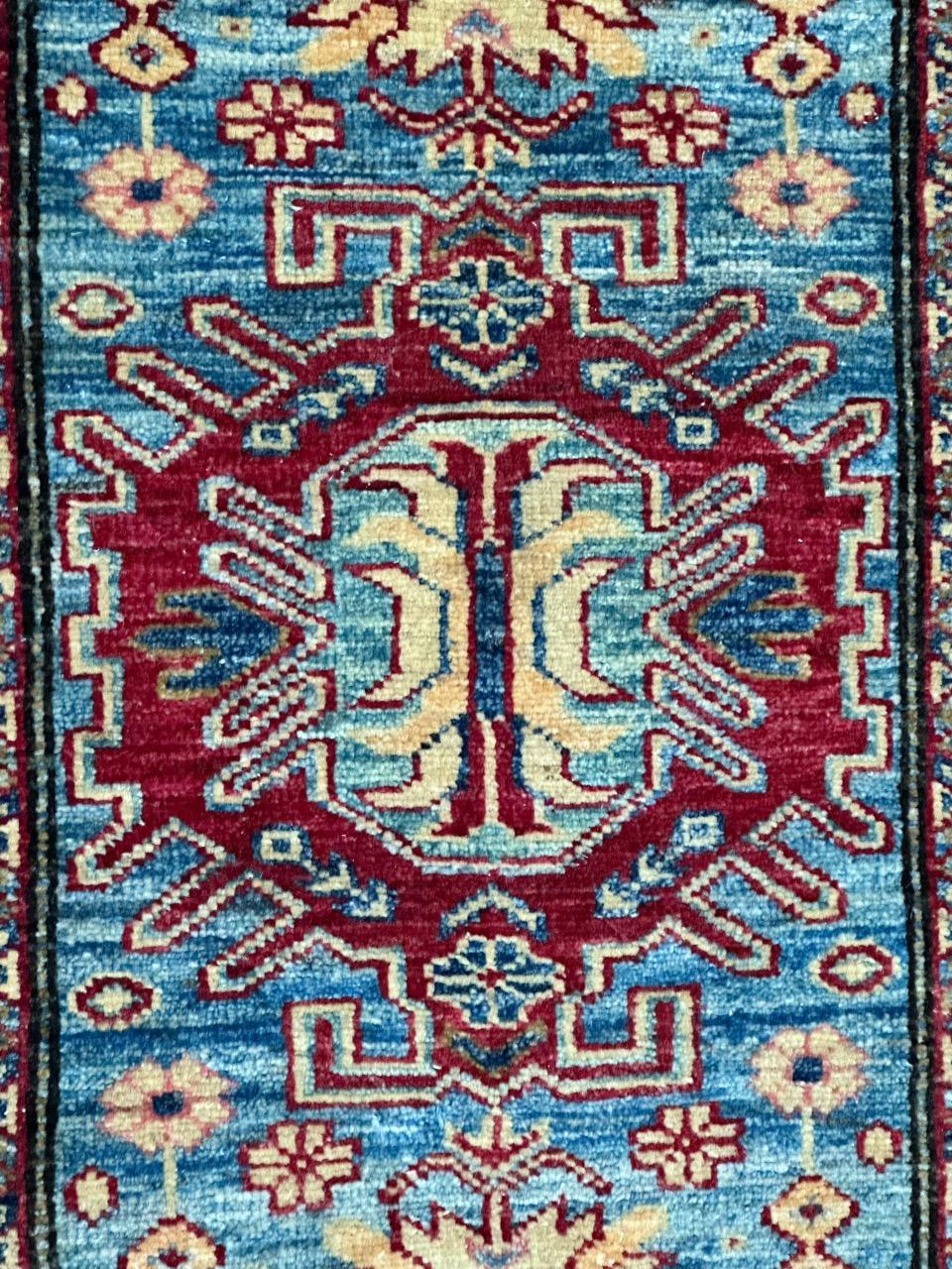 Pretty little Chobi rug with a nice design of old Caucasian rugs and beautiful colours with a sky blue field, red, yellow and beige on design, entirely hand knotted with wool on cotton foundation.

✨✨✨
