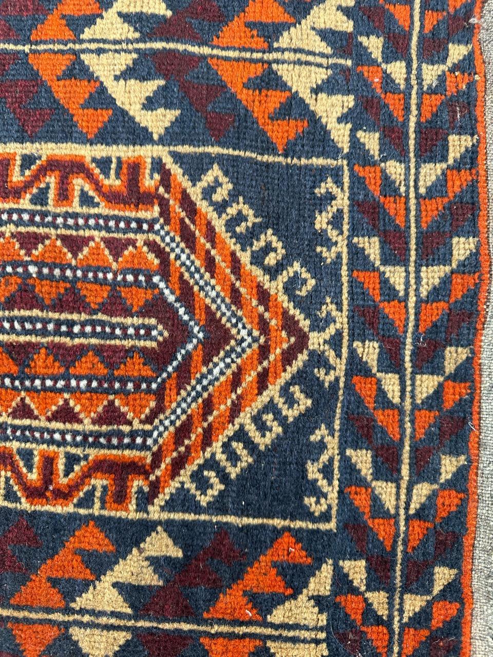 Tribal Bobyrug’s nice little vintage Baluch rug For Sale