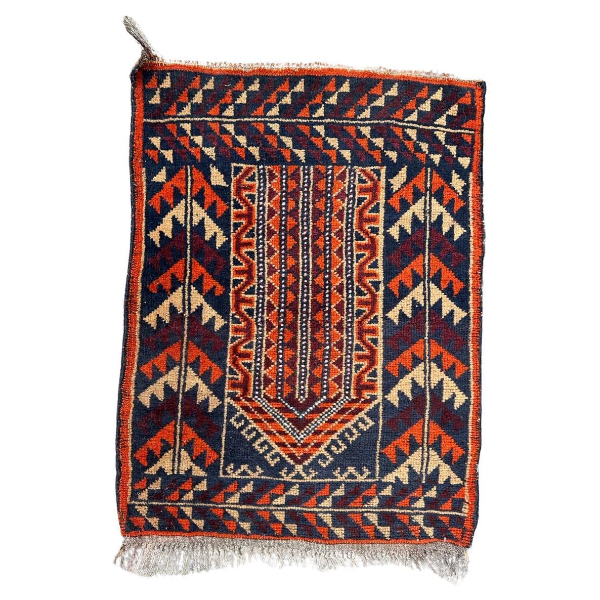 Bobyrug’s nice little vintage Baluch rug For Sale