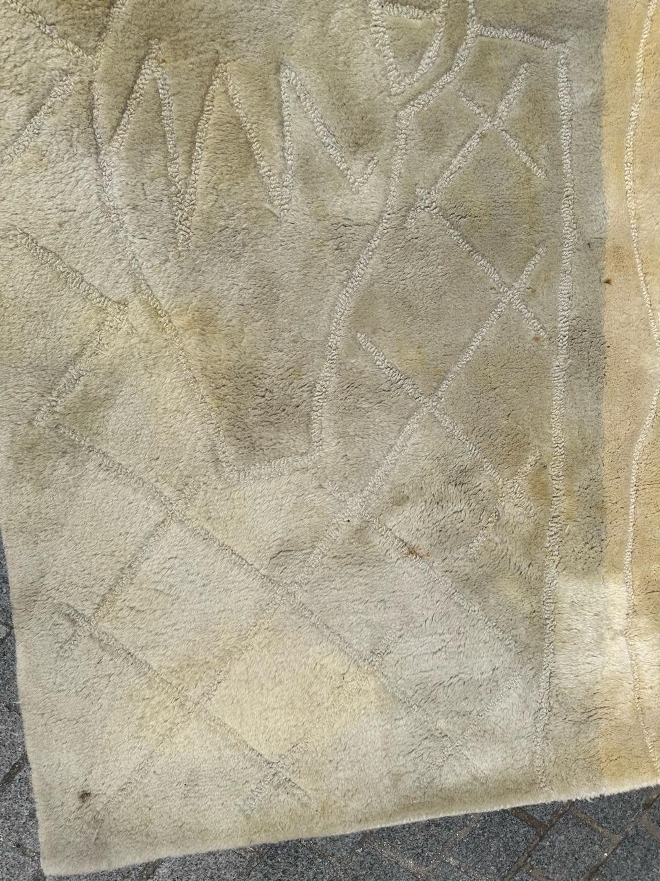 Beautiful 20th century modern rug, with an Art Deco design from Serge Lesage French designer, beautiful light colours , entirely hand tufted in India, wool velvet on cotton foundation.
Small wears 

✨✨✨
