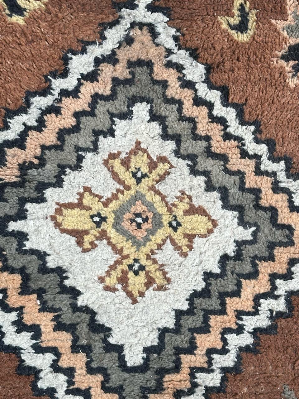 Pretty small mid century tribal Moroccan rug with a geometrical design and nice colours with brown, pink, yellow, grey, black and white, entirely hand knotted with wool on cotton foundation.

✨✨✨
