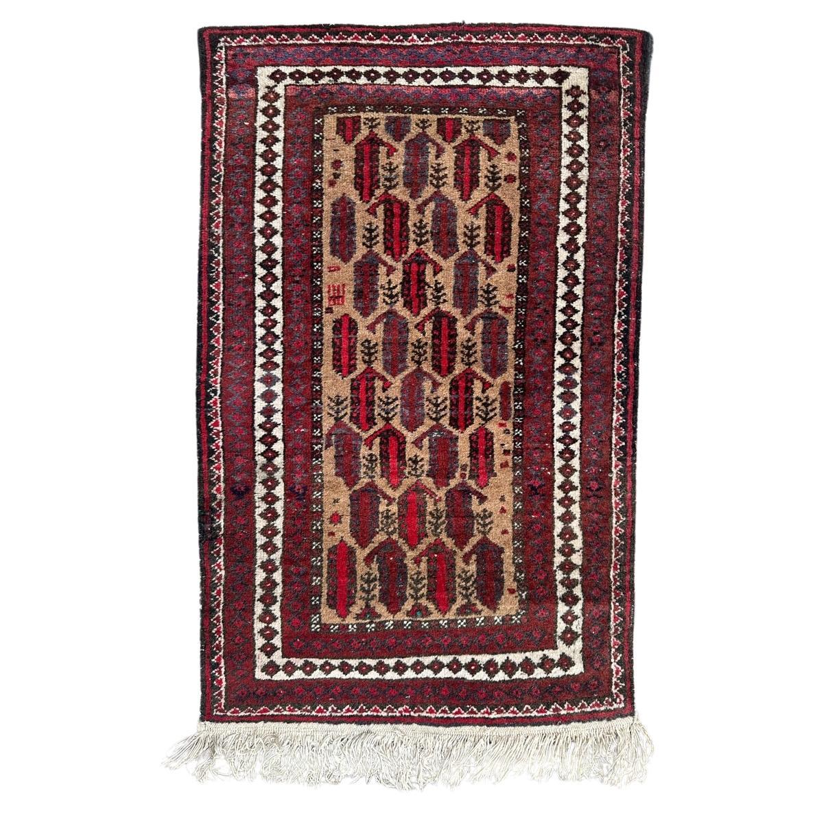 Bobyrug’s nice small vintage Baluch rug  For Sale