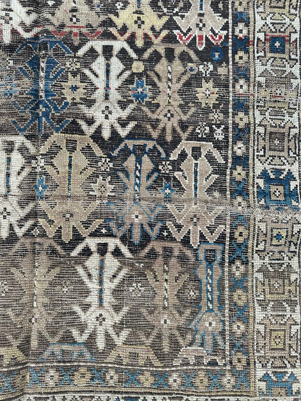 Azerbaijani Bobyrug’s pretty antique distressed Caucasian shirvan rug For Sale