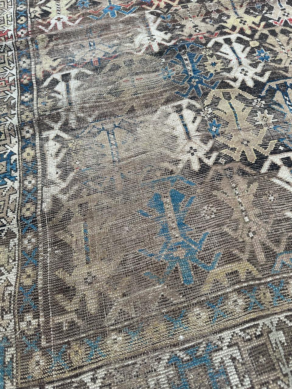 Wool Bobyrug’s pretty antique distressed Caucasian shirvan rug For Sale