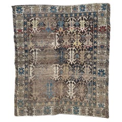 Bobyrug’s pretty antique distressed Caucasian shirvan rug