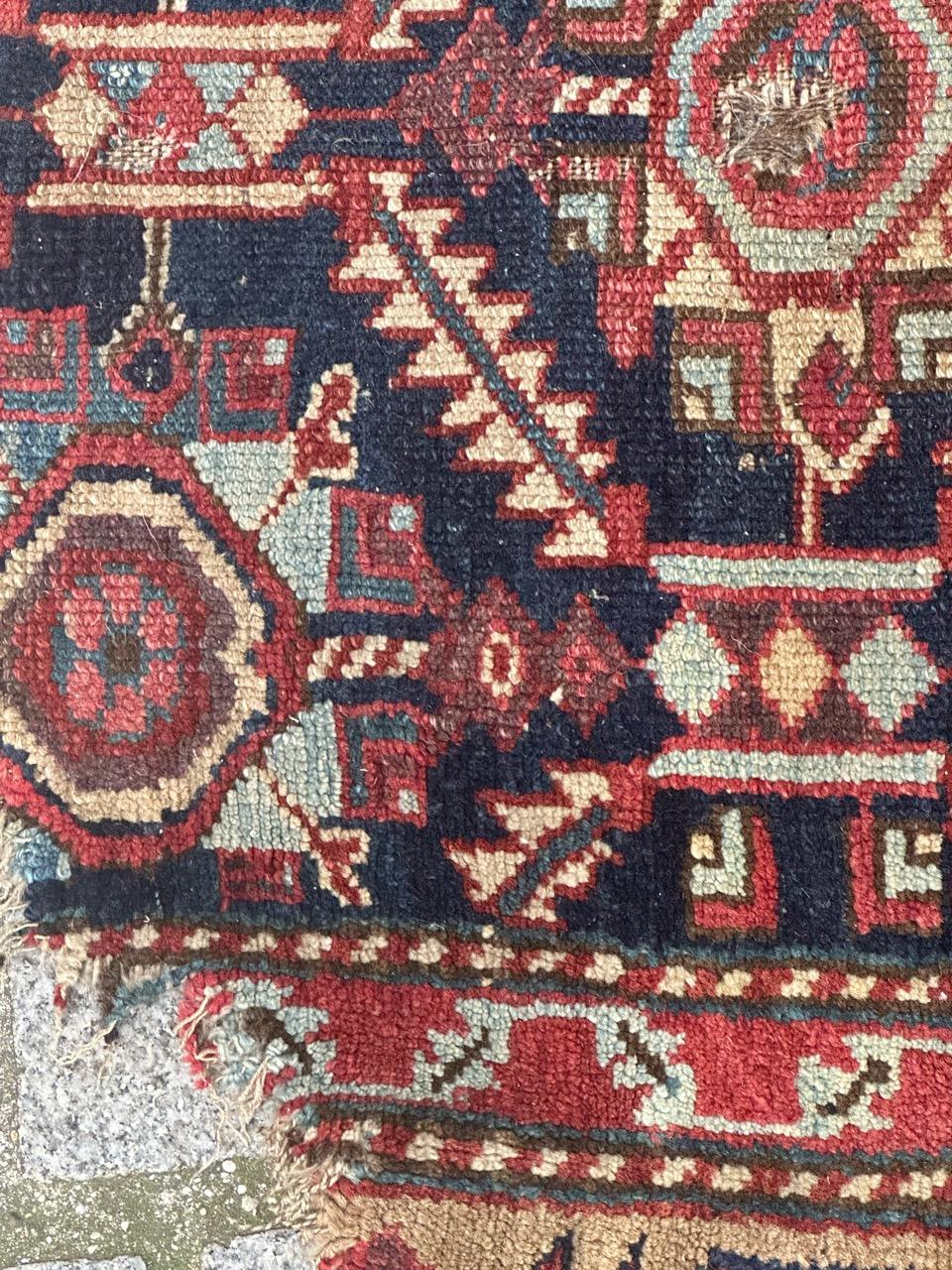 Bobyrug’s pretty antique distressed collectible north western rug fragment  In Distressed Condition For Sale In Saint Ouen, FR