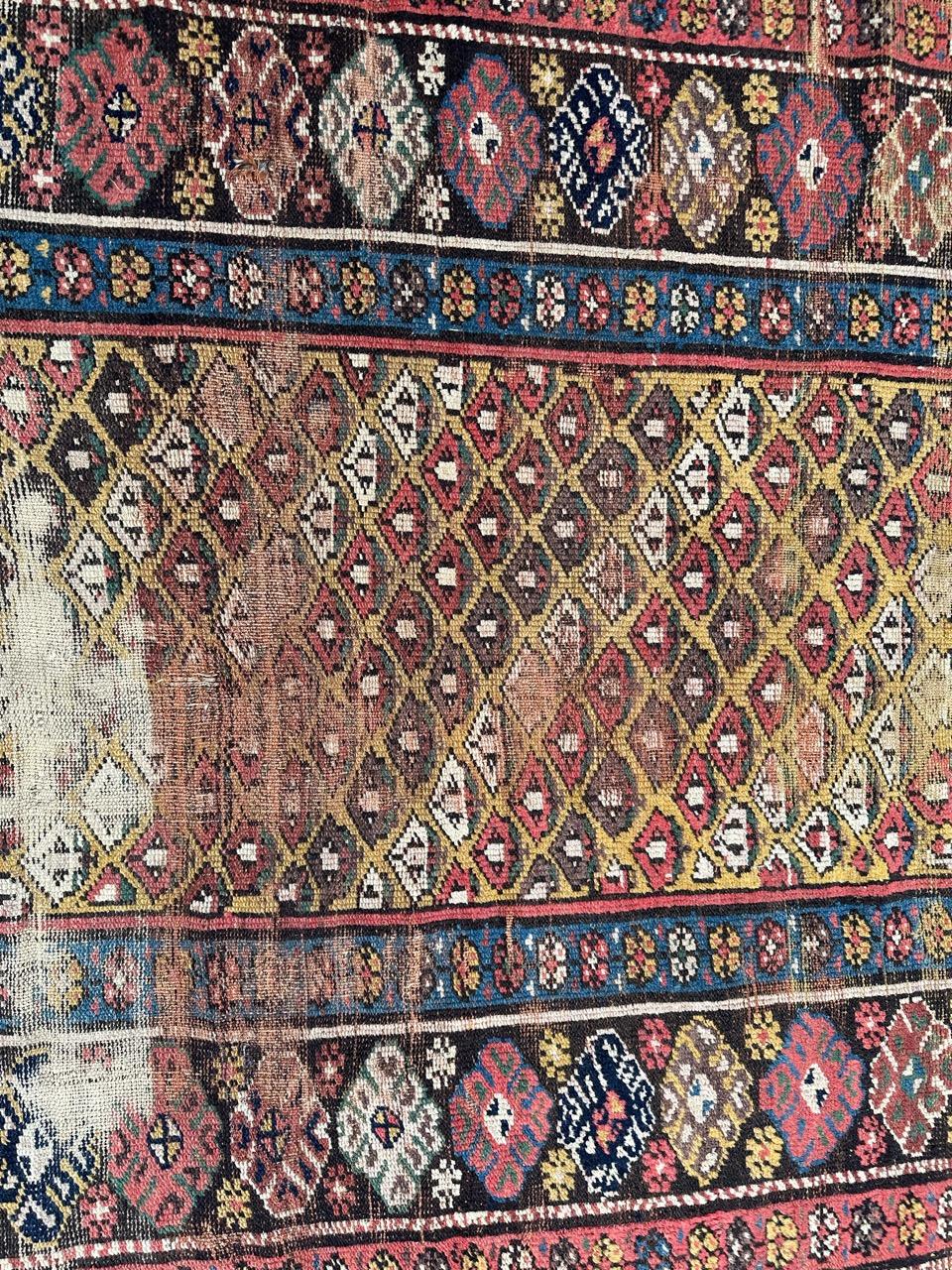 Malayer Bobyrug’s pretty antique distressed Kurdish rug  For Sale