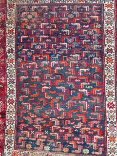Bobyrug’s pretty antique distressed malayer rug