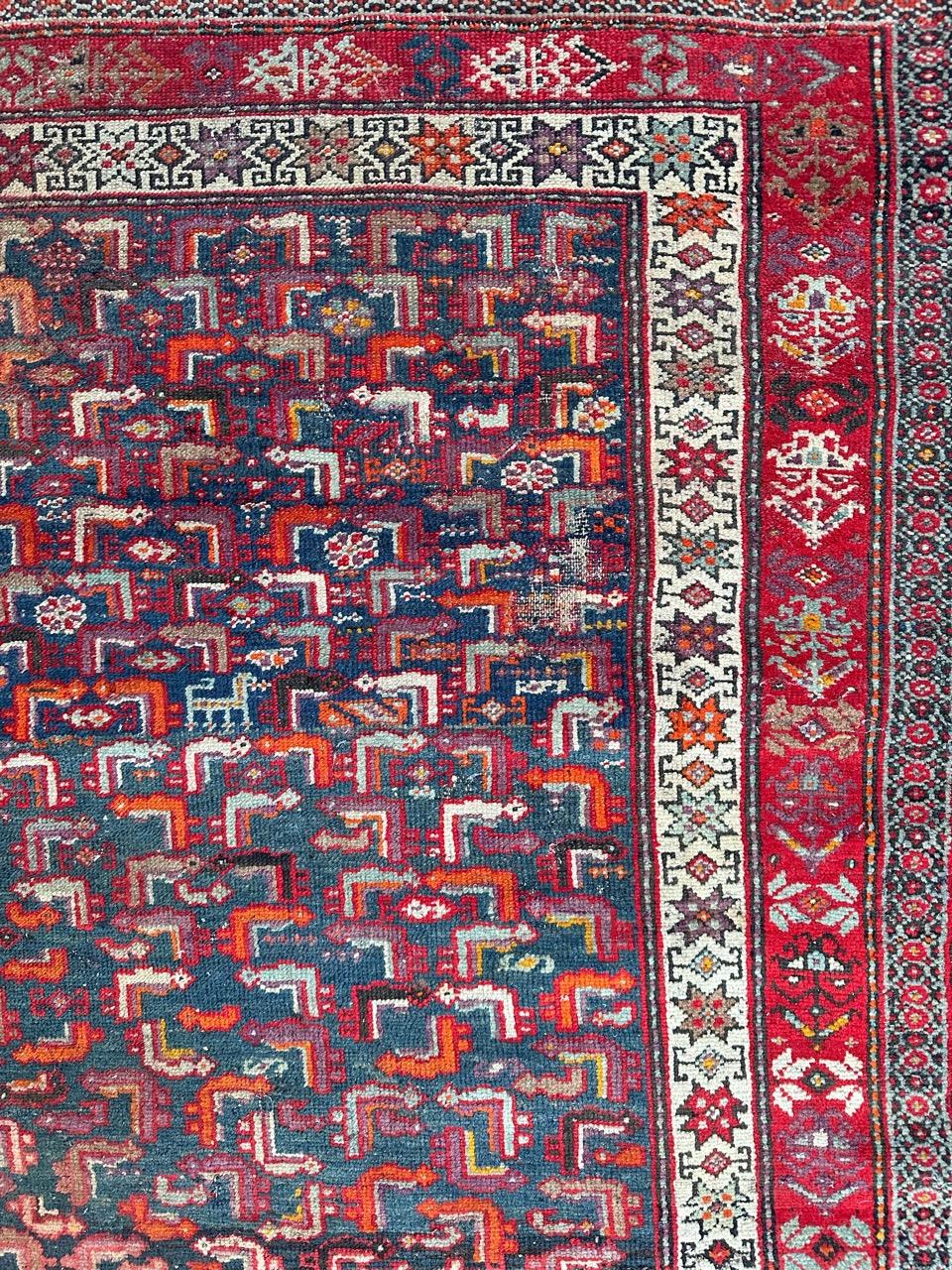 Asian Bobyrug’s pretty antique distressed malayer rug For Sale