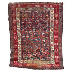 Bobyrug’s pretty antique distressed malayer rug