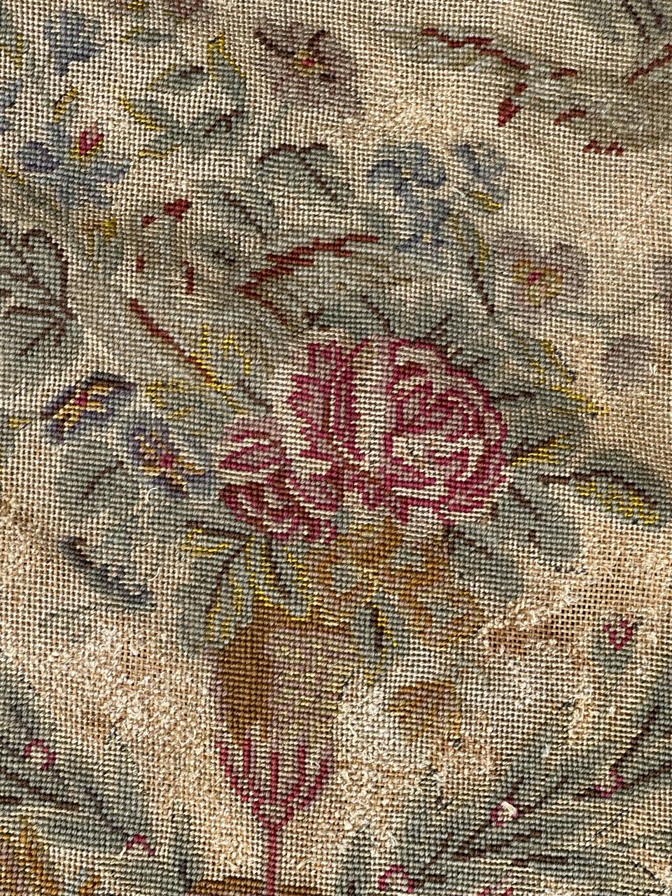 Exquisite late 19th-century French needlepoint tapestry originally from a chair cover but can be also use for cushions, or frames. Adorned with a captivating floral design from the Napoleon III era, this piece showcases vibrant natural colors.