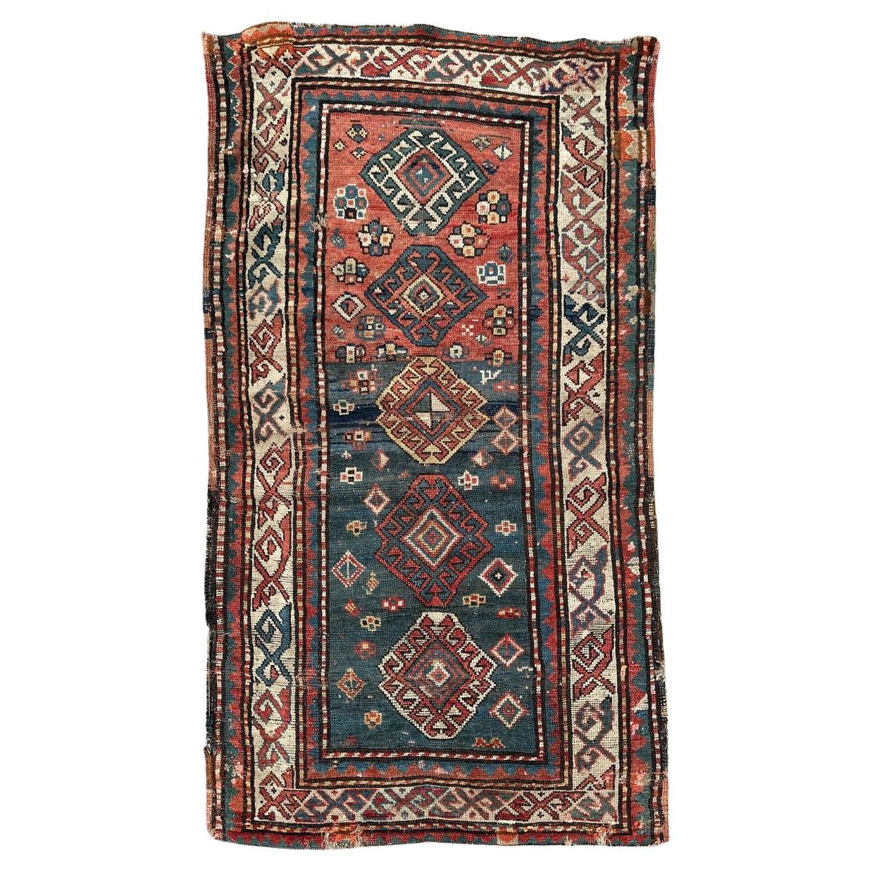 Bobyrug’s pretty antique kazak rug For Sale