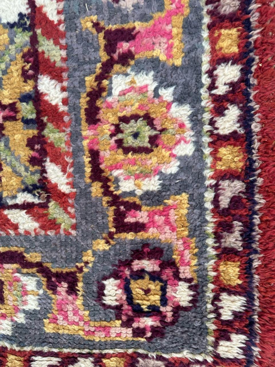 Wool Bobyrug’s pretty antique large Spanish oushak rug For Sale