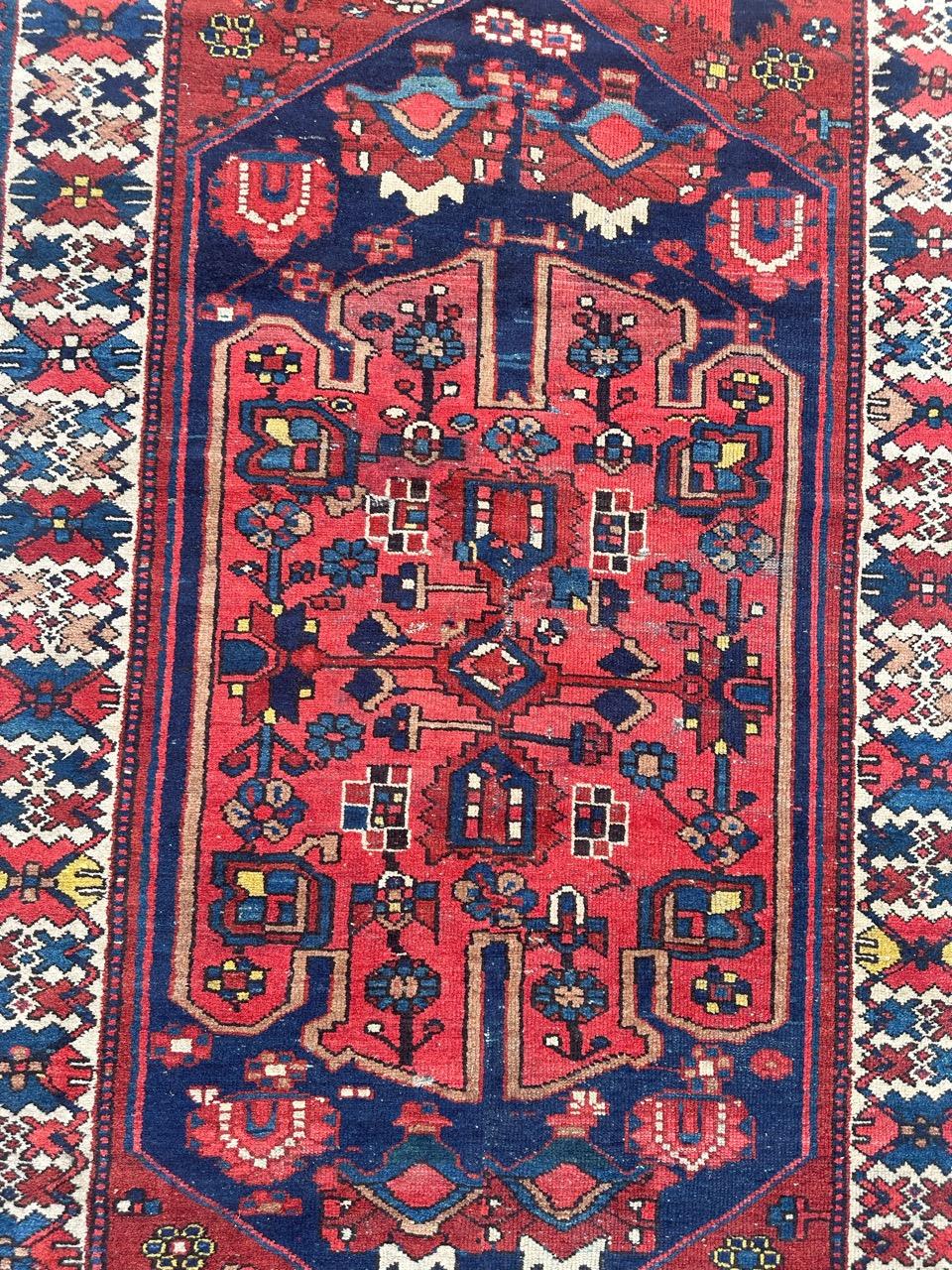 Nice antique Hamadan rug with beautiful tribal design and nice natural colours with red, navy blue, yellow, blue, green and white, entirely hand knotted with wool on cotton foundation. Reduced rug from the middle !

✨✨✨
