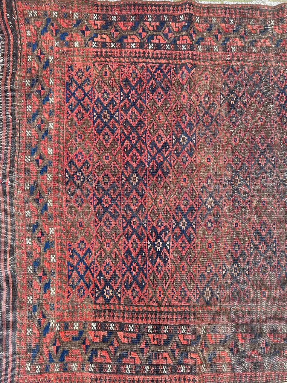 Tribal Bobyrug’s pretty antique tribal Turkmen Baluch rug For Sale