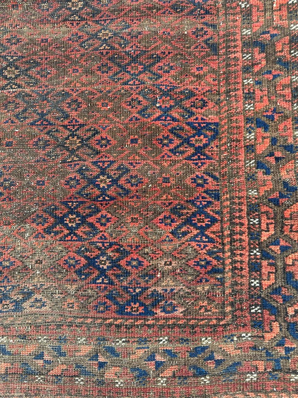 19th Century Bobyrug’s pretty antique tribal Turkmen Baluch rug For Sale