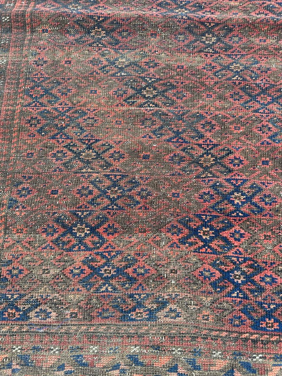 Wool Bobyrug’s pretty antique tribal Turkmen Baluch rug For Sale